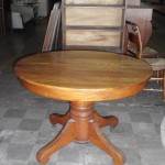 Circa 1910 refinished round oak table with 1 leaf, 42" round, 30" high   P0010   $190.